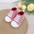Baby Shoe with Pink Polka Dot Soles